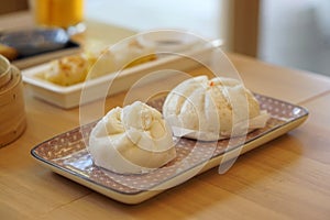 Steamed barbecue pork bun, Chinese dim sum traditional food. photo