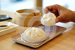 Steamed barbecue pork bun, Chinese dim sum traditional food. photo
