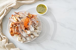 Steamed blue crab with spicy seafood sauce