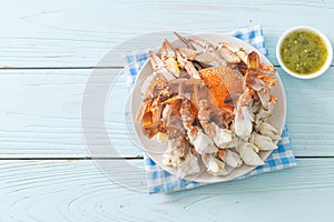 Steamed blue crab with spicy seafood sauce