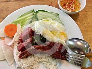 Steamed broken rice with grilled pork photo