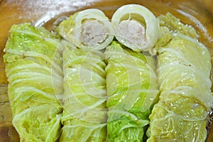 Steamed Chinese cabbage stuffed chop pork and Indian mushroom on dish