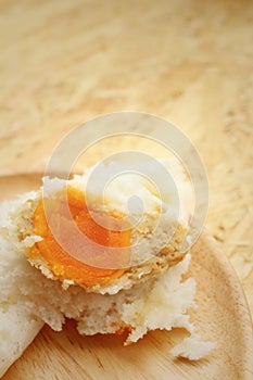 Steamed dumpling - chinese bun on brown background.