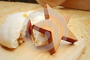 steamed dumpling - chinese bun on brown background.