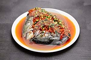 Steamed fish head with chopped hot red peppers