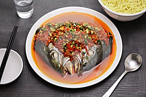 Steamed fish head with chopped hot red peppers