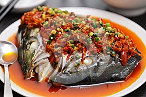 Steamed fish head with chopped hot red peppers