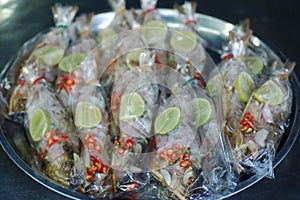 Steamed fish with lime and chillies