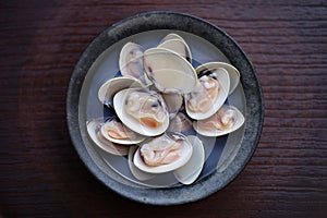 steamed Hamaguri clams with Japanese rice wine (sake). photo