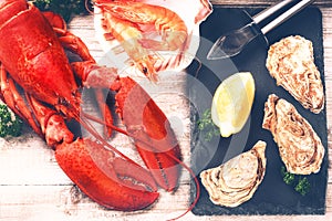 Steamed lobster, oysters and shrimps as fine selection of crustacean photo