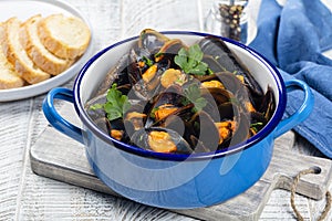 Steamed Mussels with Tomato, garlic, white wine and parsley. photo