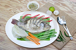 Steamed Nilotica fish,thai style steamed fish with vegetable