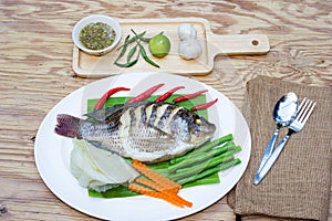Steamed Nilotica fish,thai style steamed fish with vegetable