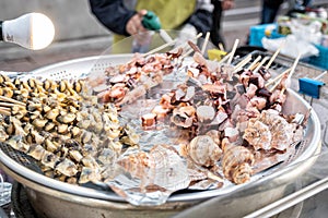 Steamed Octopus Legs  street food at Myeong-dong, Seoul, South Korea photo