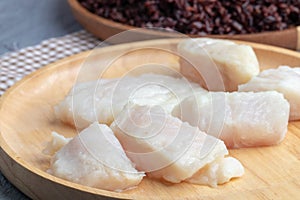 Steamed pangasius dory and riceberry rice on plate