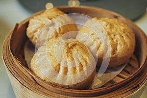 Steamed pork bun in bamboo basket