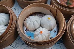 Steamed pork bun in bamboo basket