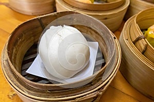 Steamed pork bun in bamboo basket