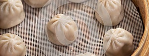 Steamed pork soup dumplings named Xiao long bao in Taiwan