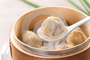 Steamed pork soup dumplings named Xiao long bao in Taiwan