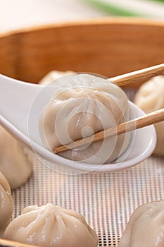 Steamed pork soup dumplings named Xiao long bao in Taiwan