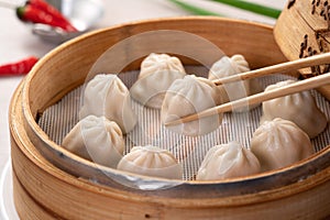 Steamed pork soup dumplings named Xiao long bao in Taiwan