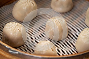 Steamed pork soup dumplings named Xiao long bao in Taiwan