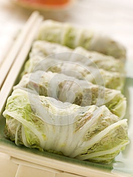 Steamed Pork and Vegetable Cabbage Rolls With Swee photo