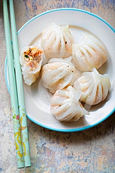 Steamed prawn dim sum. Prawns & oriental vegetables steamed in rice pastry