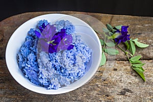 Steamed rice is mixed with a Clitoria ternatea is a herbal hair treatment.