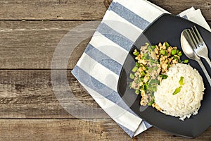 Steamed rice with stir-fried minced chicken,long bean and holy basil