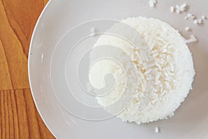 Steamed rice on white plate. photo