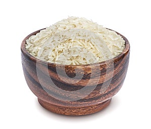 Steamed rice in a wooden bowl isolated on a white background