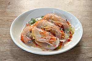 steamed river shrimp dressing Thai spicy and sour sauce salad on plate