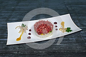 Steamed salmon trout, in the ceramic container