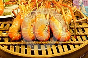 Steamed Shrimps on a Wooden Drainer