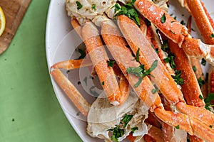 Steamed Snow Crab Legs with Garlic Butter and Parsley Flakes