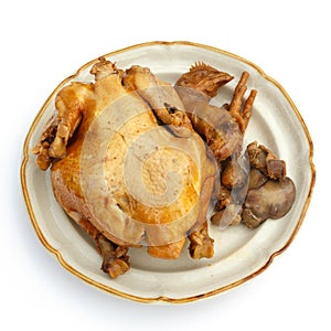 Steamed, spiced chicken and its innards.