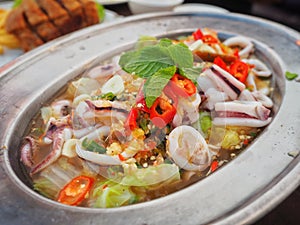 Steamed squid with lemon on dish