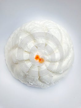 Steamed stuffed bun on white background