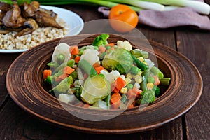 Steamed summer vegetables (broccoli, sweet corn, asparagus, brussels sprouts, carrots