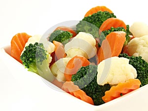 Steamed vegetables, isolated, close up