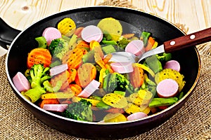 Steamed Vegetables Potatoes, Carrots and Broccoli with Sausages