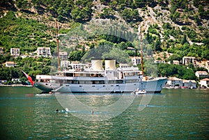 Steamer in the bay located between the mountains