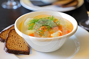 Steaming bowl of traditional Salmon soup