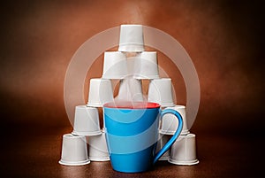 Steaming Coffee and Pod Pyramid Copper Background