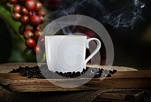 Steaming Coffee with red Coffee beans in background