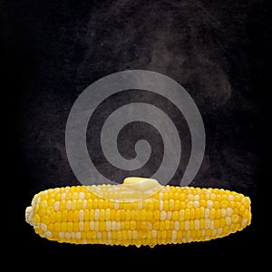 Steaming corn with melting butter (Clipping path on the corn inc
