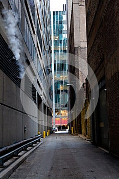 Narrow back alley in Chicago concrete jungles
