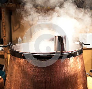Steaming mulled wine boiler